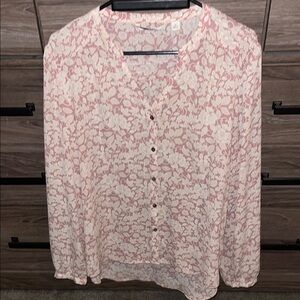Pink long sleeve button down blouse with v-neck and notched collar